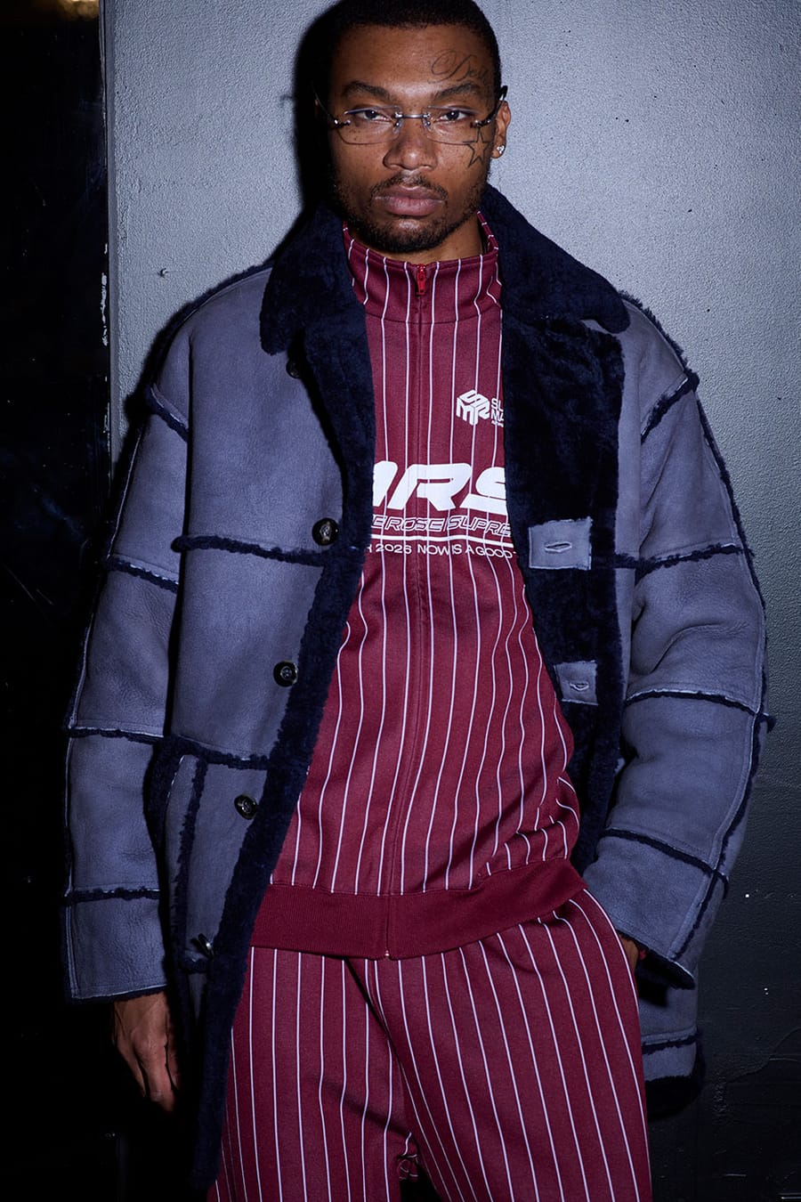 Model wearing the Martine Rose x Supreme Jeff Hamilton shearling coat